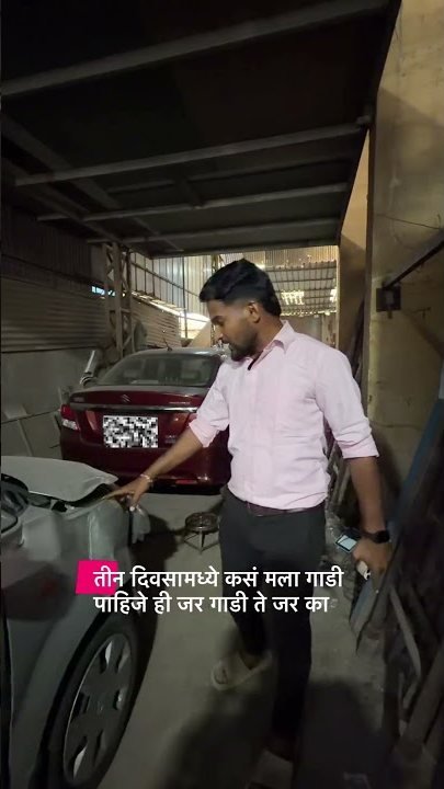 Accident-damaged car being repaired in a bay at the Grand Automotive bodyshop, Panvel