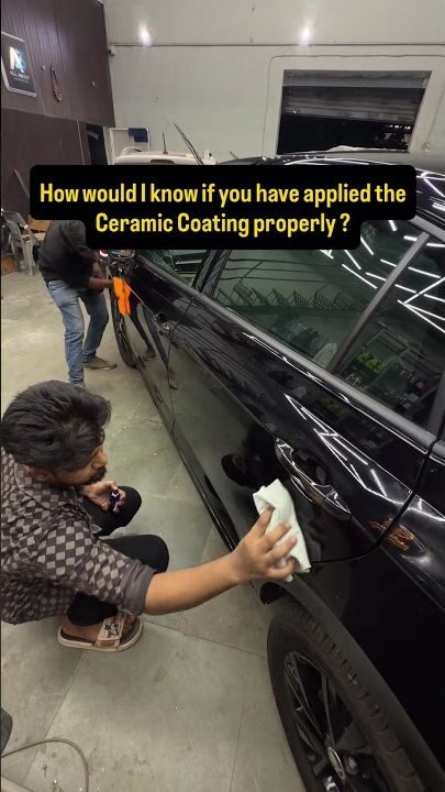 9H ceramic coating being applied to a car panel at the A3 Panvel detailing studio