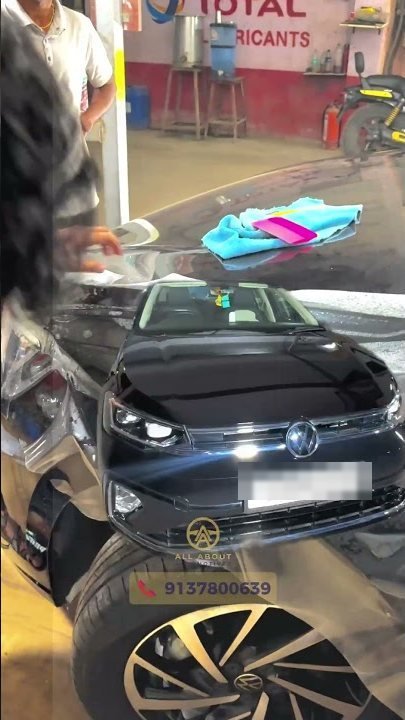 Technician fitting TPU self-healing paint protection film to a customer car in Panvel